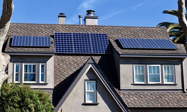 A house with solar panels on the roof.