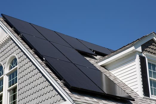 A house with solar panels on the roof.